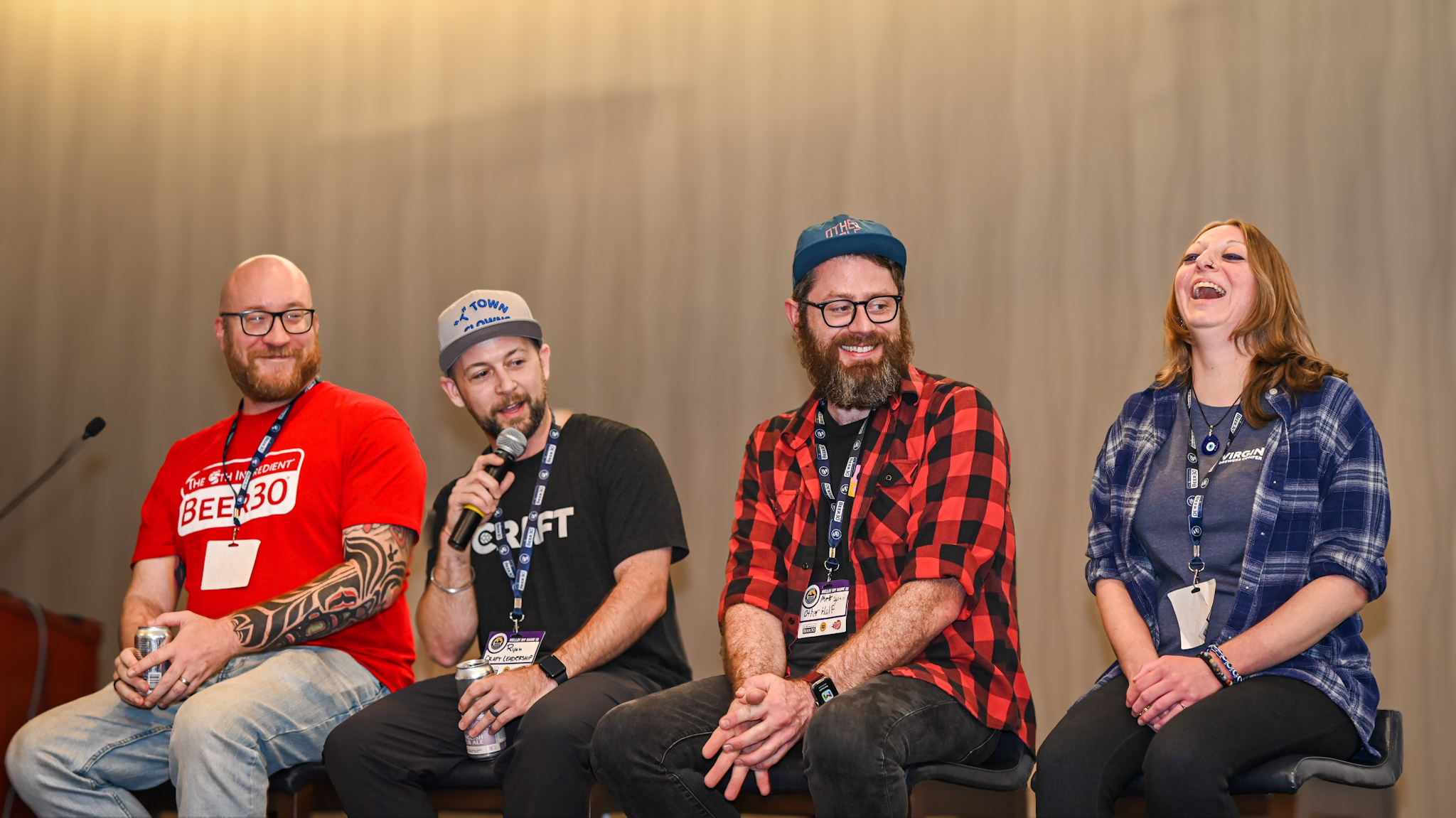 Ryan Mayfield sharing a light moment with fellow panelists